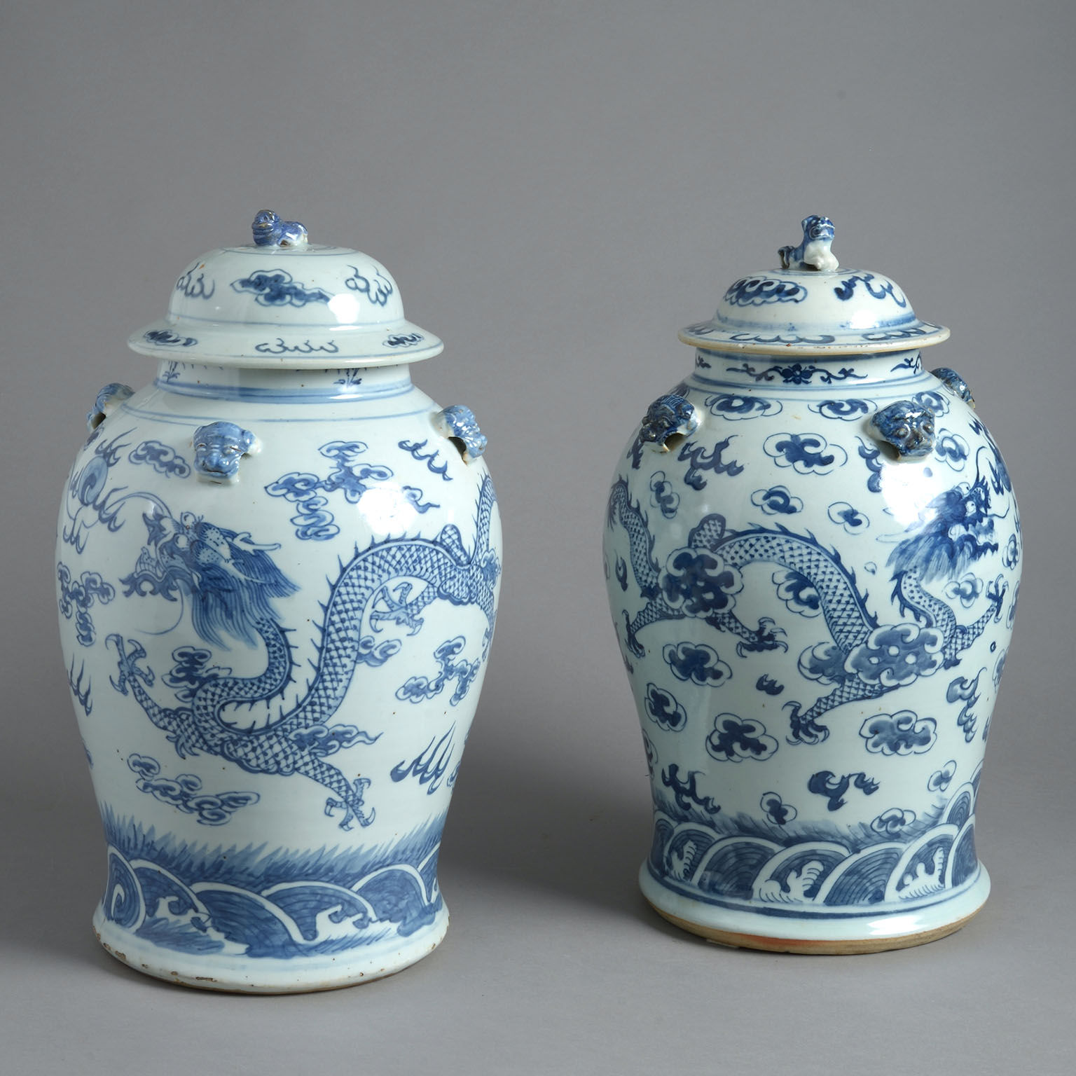 A Close Pair of Chinese Blue and White Porcelain Covered Jars or 'Temple Jars'