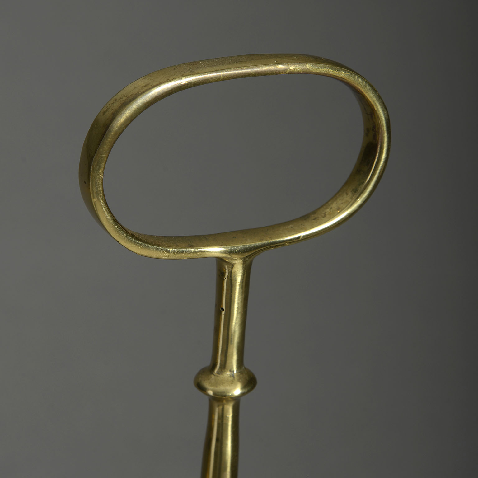A Bell Form Brass Doorstop