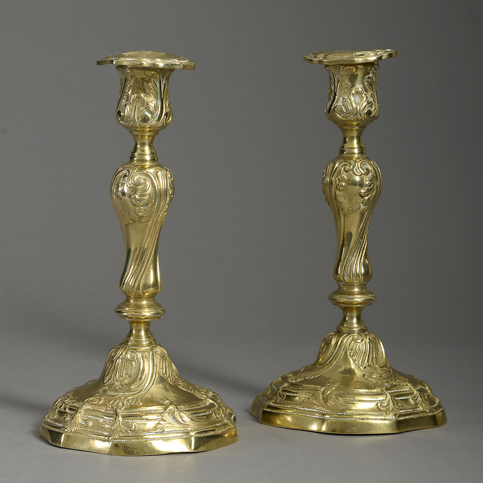 Pair of Rococo Brass Candlesticks