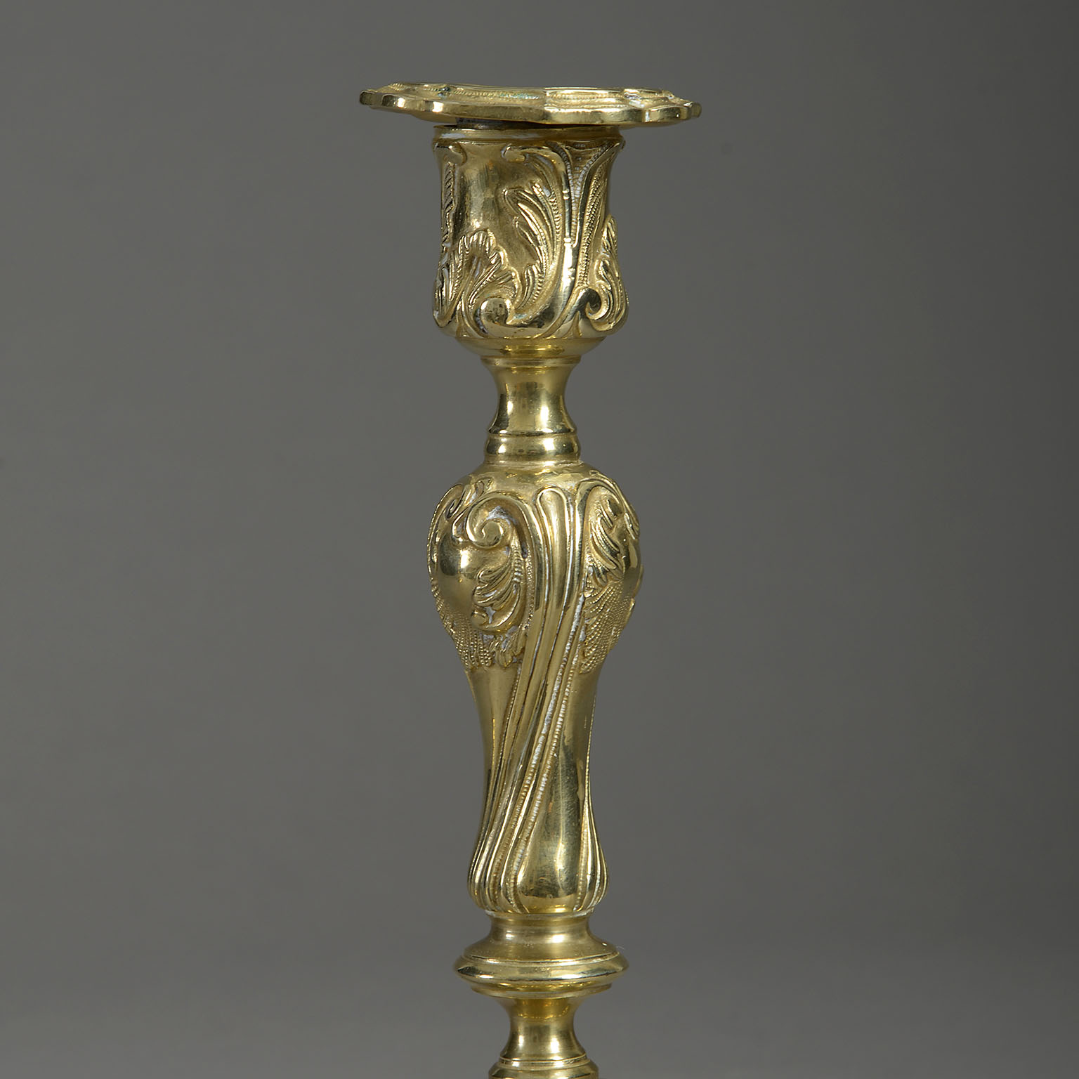 Pair of Rococo Brass Candlesticks