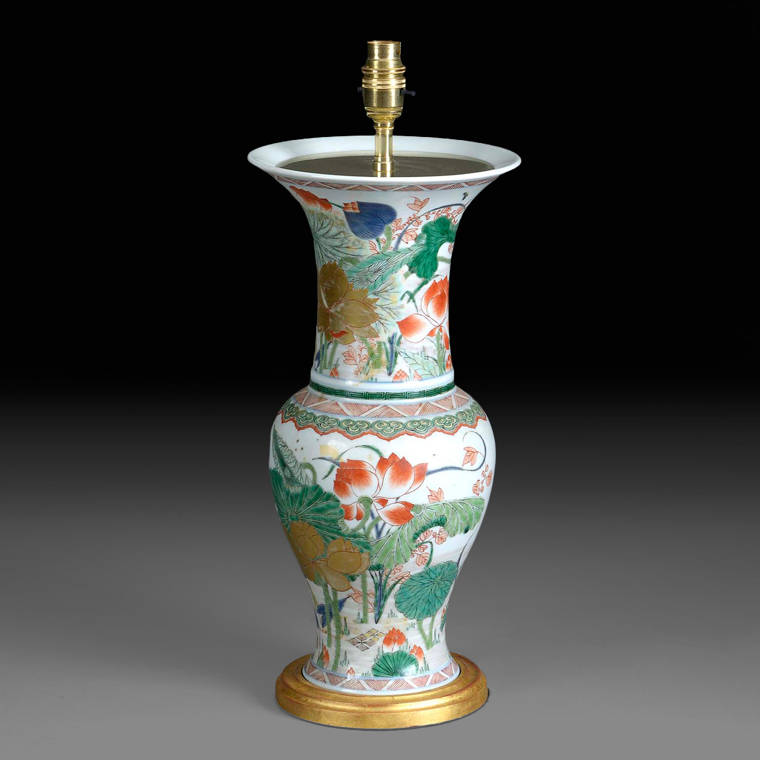 19th century famille verte porcelain trumpet vase lamp without shade, on a turned gilded base
